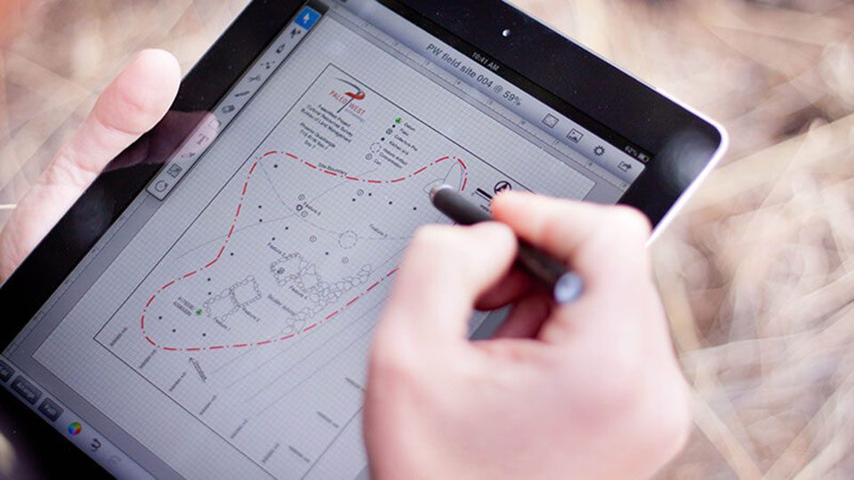 iPad with touch pen showing a map