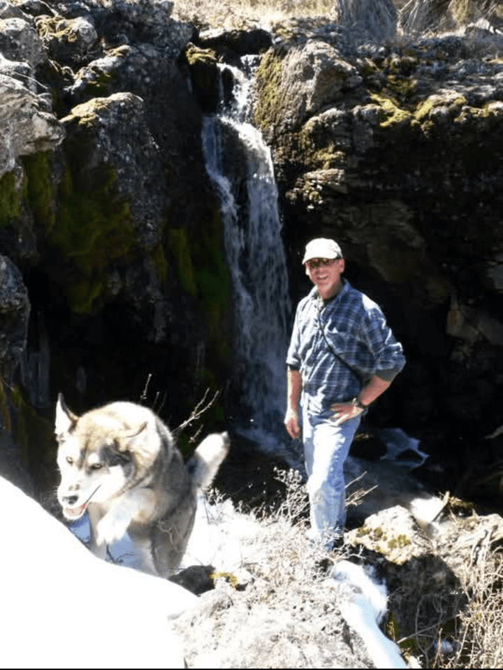 Epstein surveying in Oregon with his dog, Libbie Mae. 