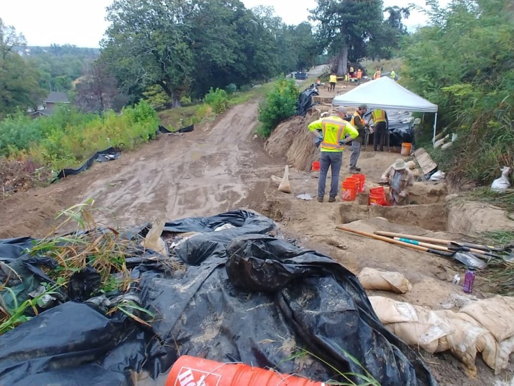 A view of the archaeological excavations across the affected portion of Section T of the national cemetery.